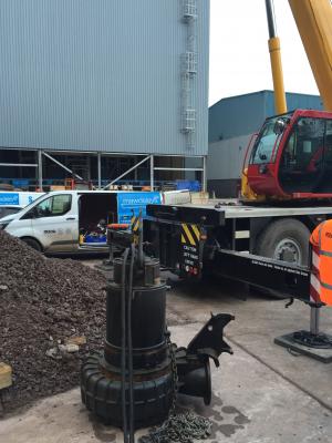 Leaking pump being replaced