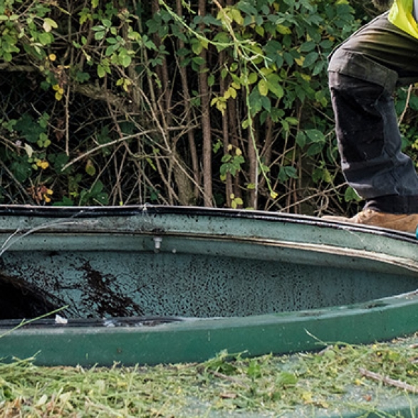 An engineer inspecting a sewage treatment plant
