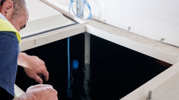 engineer checking a water hygiene system