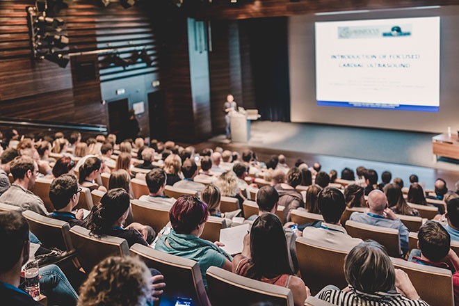 students listening to a lecture at university