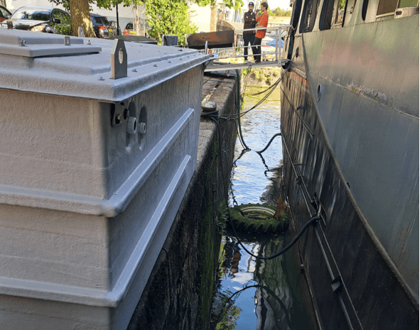 Water storage tank with booster set on boat