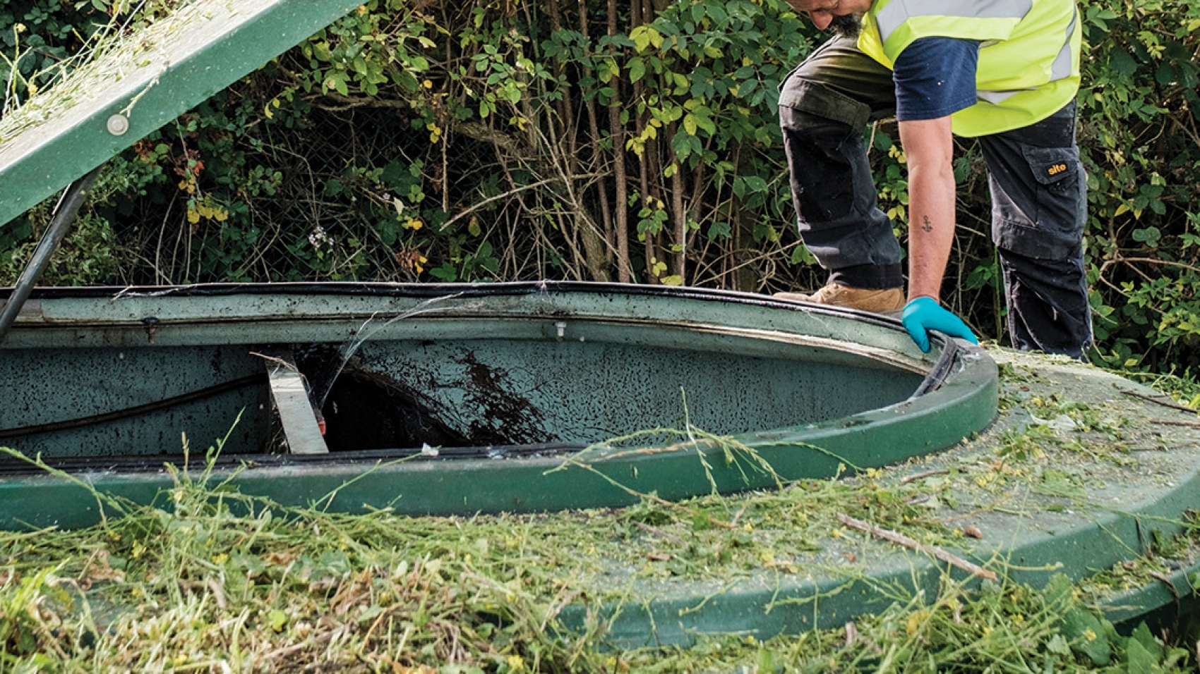 An engineer inspecting a sewage treatment plant
