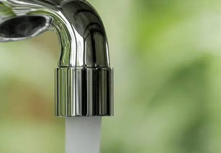 An image of a running tap